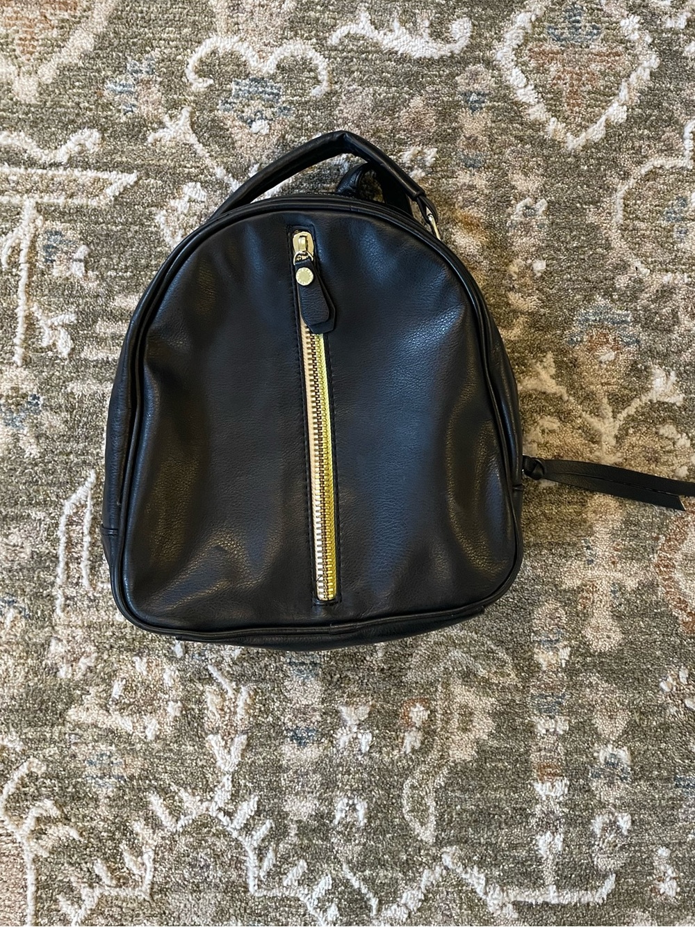 Steve Madden Black Mini Backpack with Gold Zip Accent